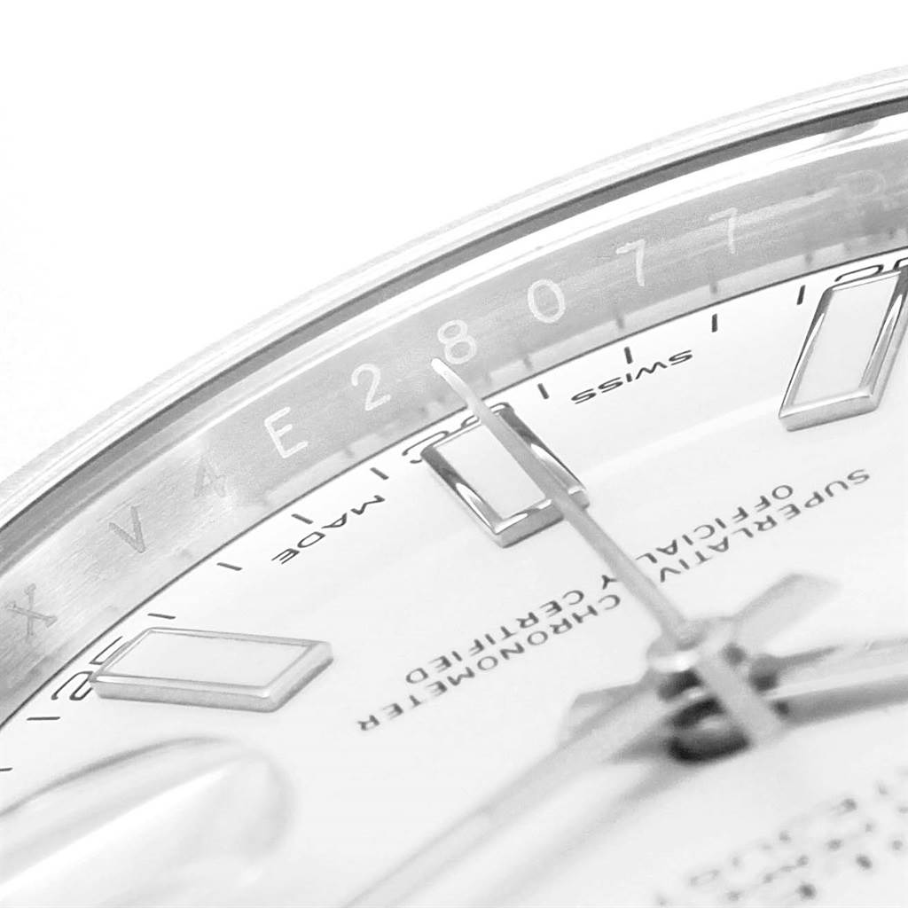 This close-up image of a Rolex Datejust 41 116300 Men's Stainless Steel White Dial 116300 Men's Stainless Steel White Dial watch highlights the dial, hands, and part of the rehaut.