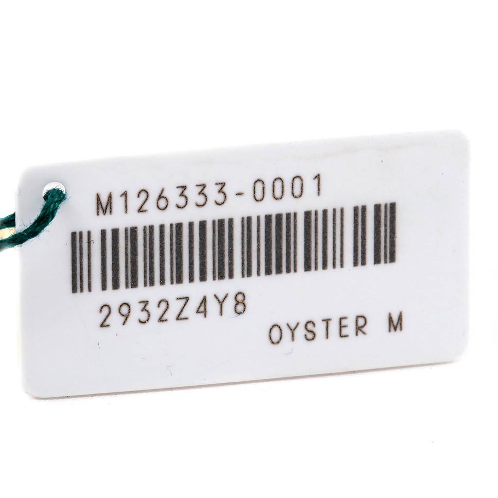 This image shows the tag for the Rolex Datejust 41 126333 Men's Steel and Gold (two tone) Silver Dial 126333 Men's Steel and Gold (two tone) Silver Dial with model number M126333-0001 and the word "Oyster" printed on it.
