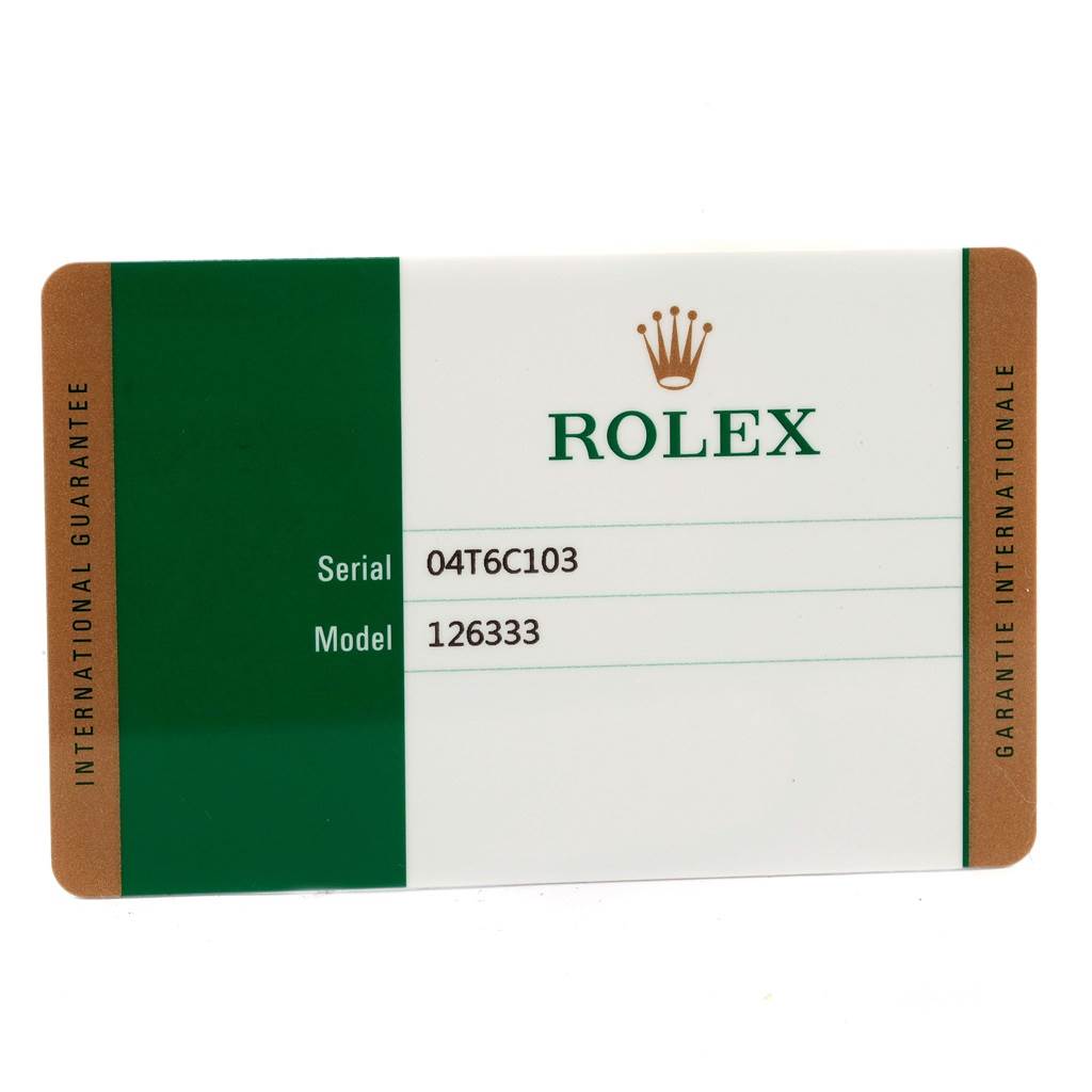 This is an international guarantee card for the Rolex Datejust 41 126333 Men's Steel and Gold (two tone) Black Dial 126333 Men's Steel and Gold (two tone) Black Dial model, showing the serial and model numbers.