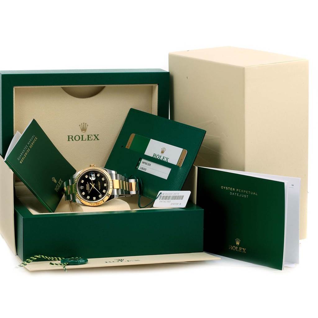 The image shows a Rolex Datejust 41 126333 Men's Steel and Gold (two tone) Black Dial 126333 Men's Steel and Gold (two tone) Black Dial watch in its open case with various documents and tags displayed around it.