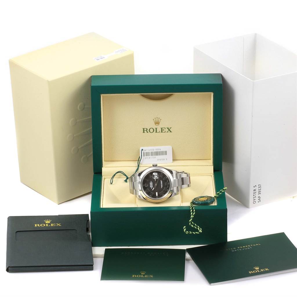 The Rolex Datejust 41 116300 Men's Stainless Steel Grey Dial 116300 Men's Stainless Steel Grey Dial watch is displayed in its open box, with manuals and accessories around it.