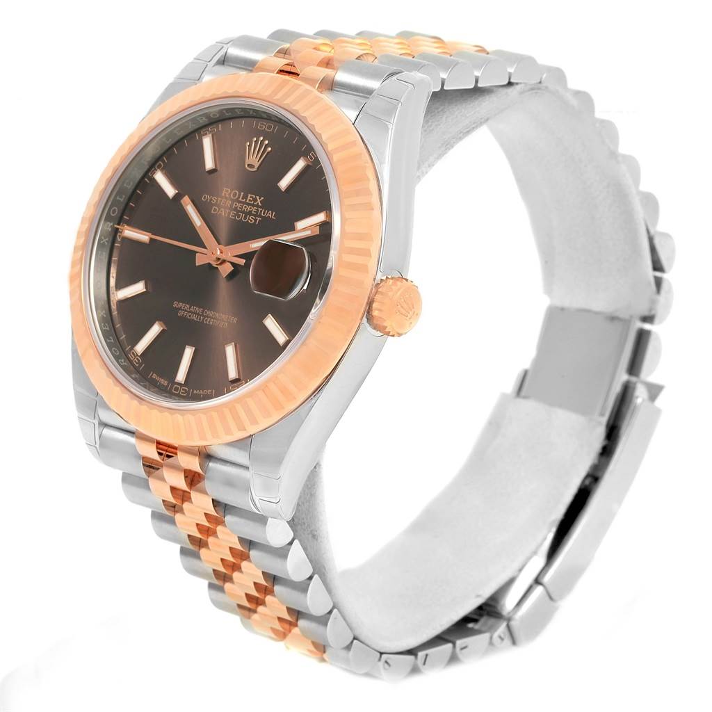 The Rolex Datejust 41 126331 Men's Steel and Gold (two tone) Brown Dial 126331 Men's Steel and Gold (two tone) Brown Dial is shown at an angled view, displaying the rose gold bezel, black dial, and two-tone bracelet.