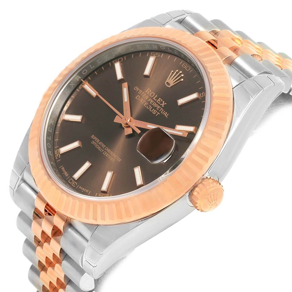 The image shows a close-up, side angle of a Rolex Datejust 41 126331 Men's Steel and Gold (two tone) Brown Dial 126331 Men's Steel and Gold (two tone) Brown Dial watch, highlighting the dial, bezel, crown, and part of the bracelet.