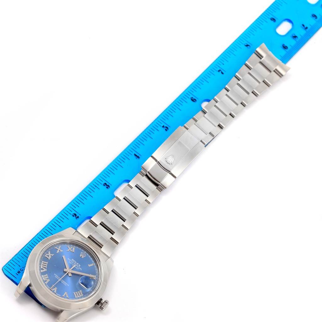 The image shows the full layout of the Rolex Datejust 41 116300 Men's Stainless Steel Blue Dial 116300 Men's Stainless Steel Blue Dial watch, including its blue dial, Roman numerals, and metal bracelet.