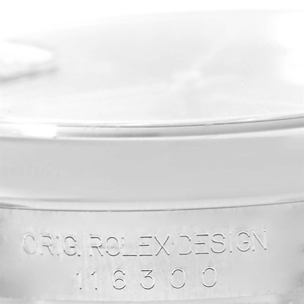 This image shows a close-up of the side of the Rolex Datejust 41 116300 Men's Stainless Steel Blue Dial 116300 Men's Stainless Steel Blue Dial, highlighting the engraved design and model number.