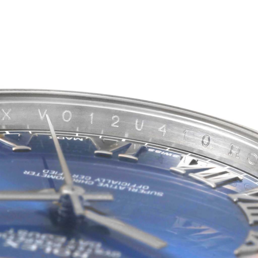 This image shows a close-up view of the dial and rehaut inscription of a Rolex Datejust 41 116300 Men's Stainless Steel Blue Dial 116300 Men's Stainless Steel Blue Dial watch.