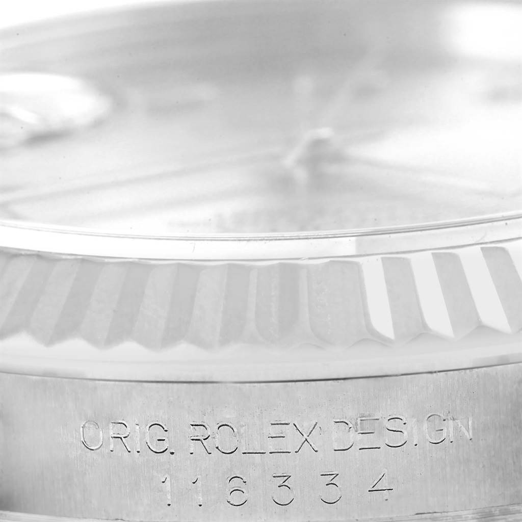 This image shows a close-up of the side of the Rolex Datejust 41 116334 Men's Stainless Steel Grey Dial 116334 Men's Stainless Steel Grey Dial watch, highlighting the text "ORIG. ROLEX DESIGN" and the model number.