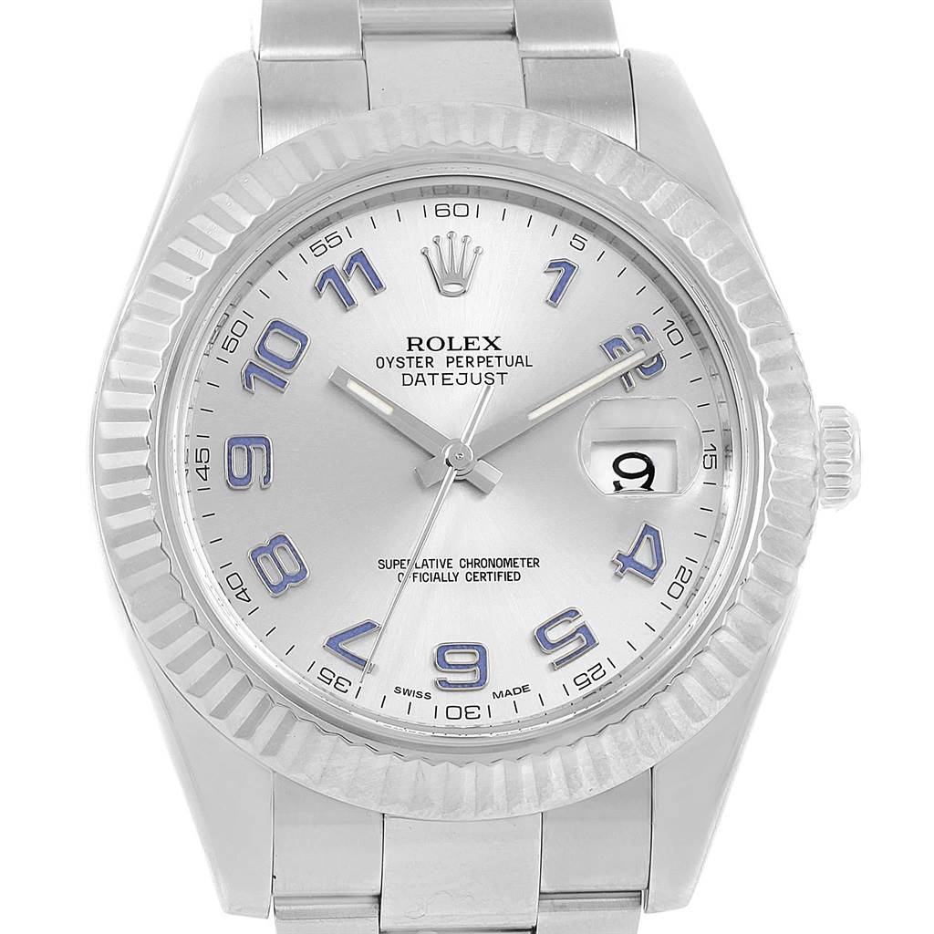 The image shows a Rolex Datejust 41 116334 Men's Stainless Steel Grey Dial 116334 Men's Stainless Steel Grey Dial watch from a front angle, highlighting its silver dial, blue numerals, date window, and fluted bezel.