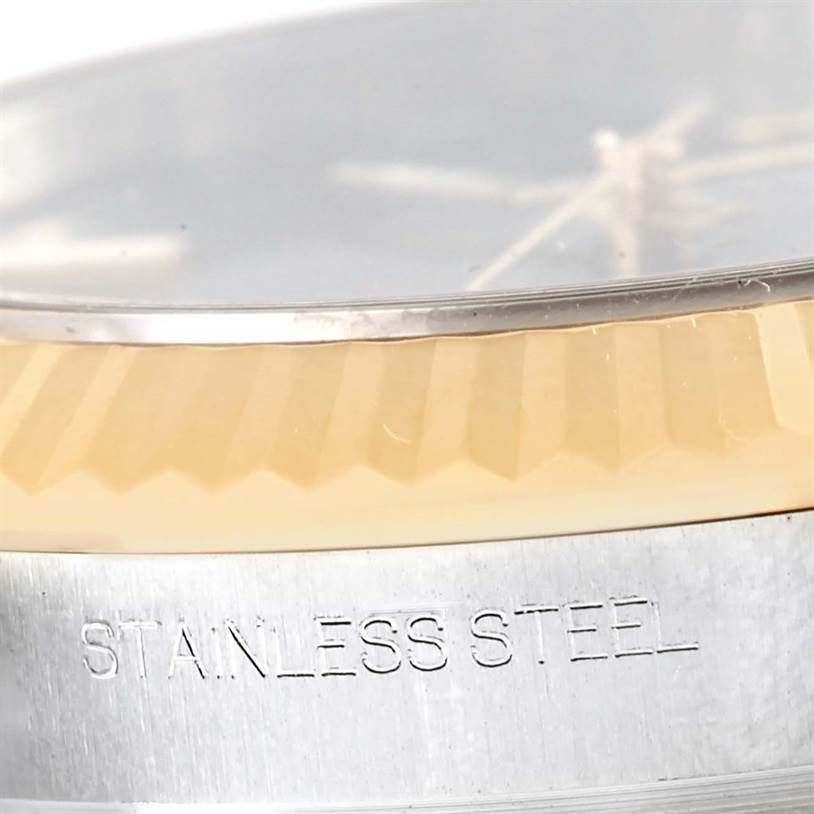 The image shows a close-up of the bezel and stainless steel casing of a Rolex Datejust 41 116333 Men's Steel and Gold (two tone) Grey Dial 116333 Men's Steel and Gold (two tone) Grey Dial watch.
