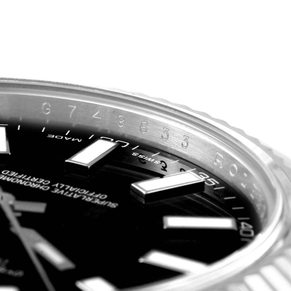 This image shows a close-up of the dial and bezel of a Rolex Datejust 41 116334 Men
s Stainless Steel Black Dial 116334 Men
s Stainless Steel Black Dial watch.