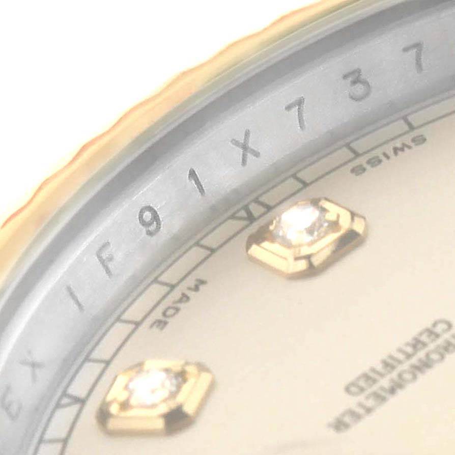 Close-up of the dial, diamond indices, and rehaut of the Rolex Datejust 41 116333 Men's Steel and Gold (two tone) Silver Dial 116333 Men's Steel and Gold (two tone) Silver Dial.