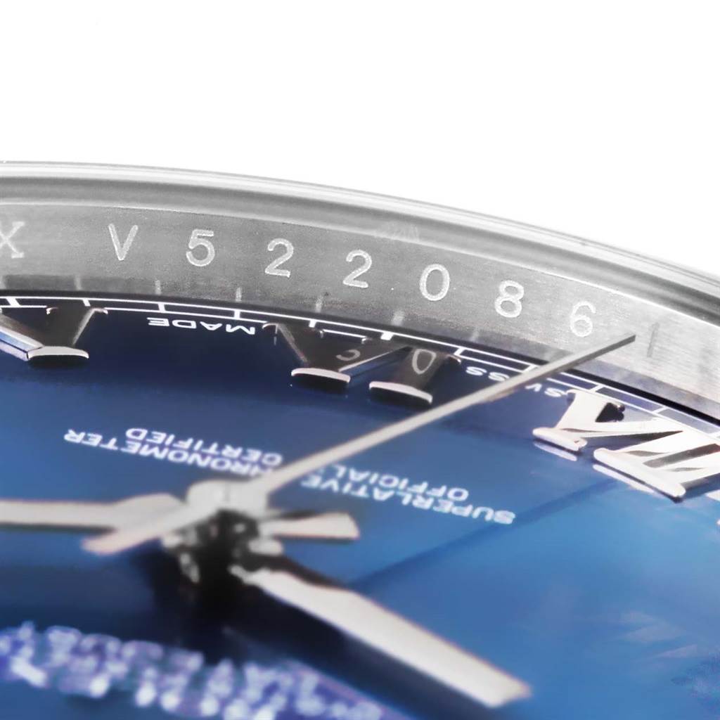 This close-up image shows the dial and rehaut of a Rolex Datejust 41 116300 Men's Stainless Steel Blue Dial 116300 Men's Stainless Steel Blue Dial model, highlighting the seconds hand and engraved serial number.