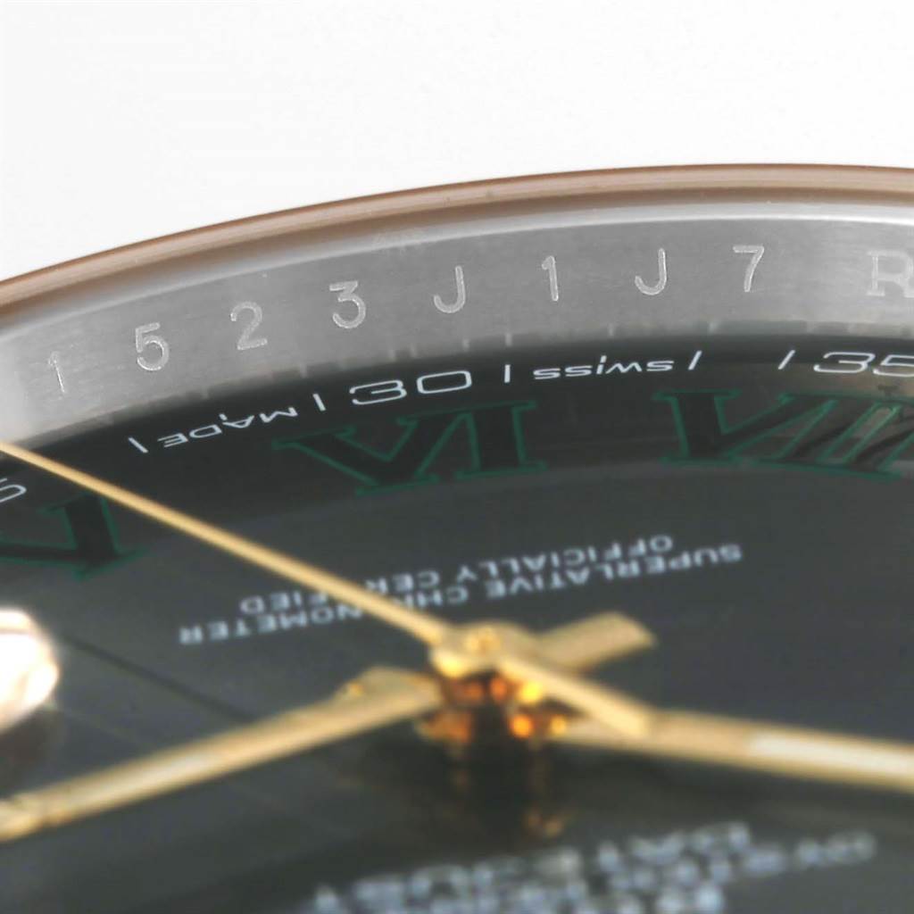The image shows a close-up of the dial and the inner bezel of a Rolex Datejust 41 126303 Men's Steel and Gold (two tone) Grey Dial 126303 Men's Steel and Gold (two tone) Grey Dial watch, capturing part of the hour markers and hands.