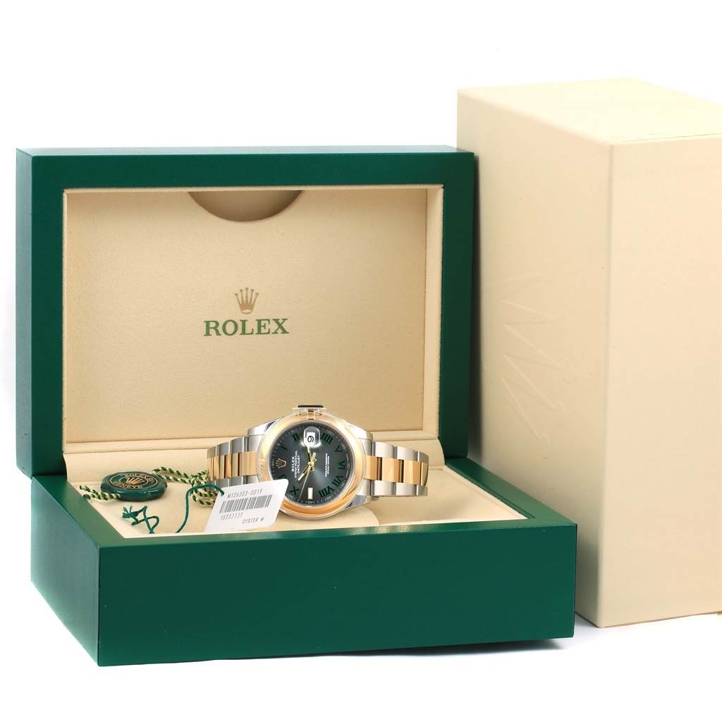 The Rolex Datejust 41 126303 Men's Steel and Gold (two tone) Grey Dial 126303 Men's Steel and Gold (two tone) Grey Dial is shown from a frontal angle in its green and beige box, with tags visible.