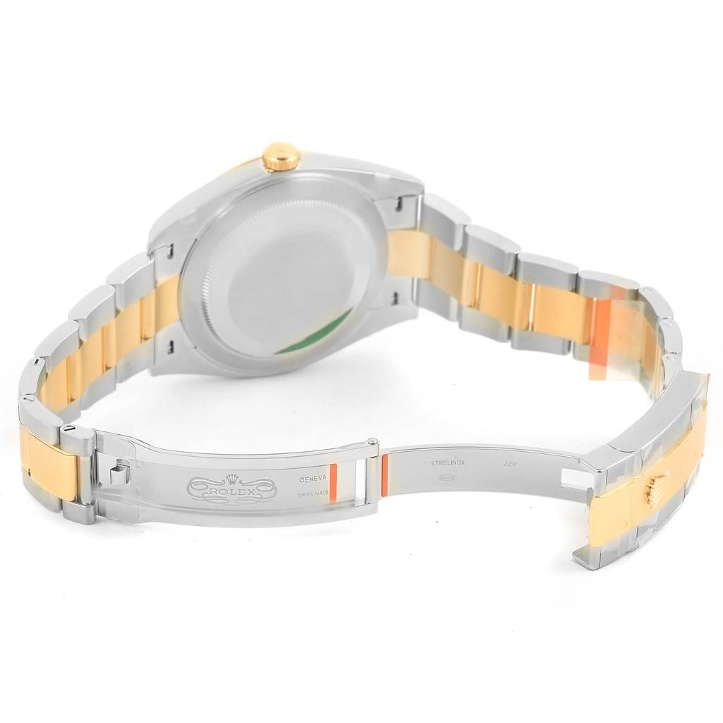 This image shows the back and open clasp of the Rolex Datejust 41 126303 Men's Steel and Gold (two tone) Grey Dial 126303 Men's Steel and Gold (two tone) Grey Dial watch, highlighting its two-tone metal bracelet.