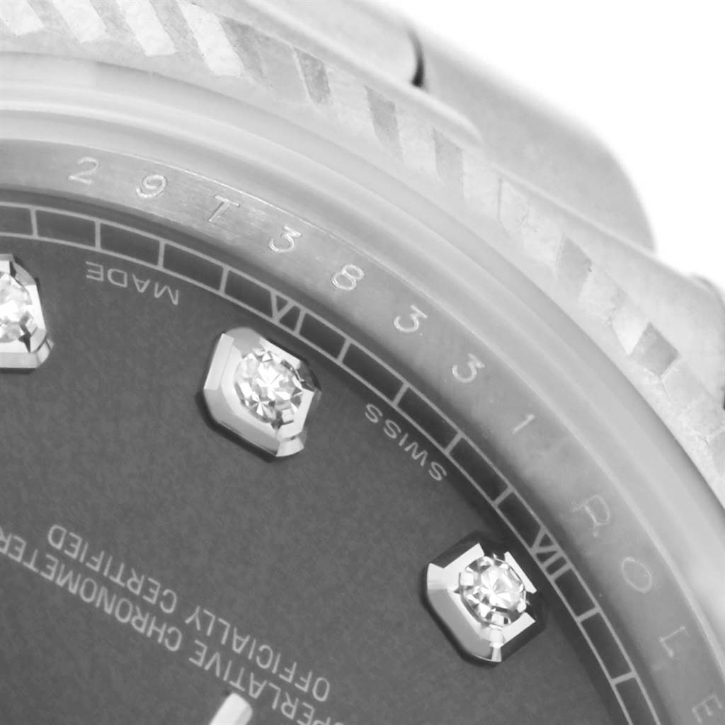 The image shows a close-up of the dial and bezel of a Rolex Datejust 41 116334 Men's Stainless Steel Grey Dial 116334 Men's Stainless Steel Grey Dial, highlighting diamond markers and the date window.