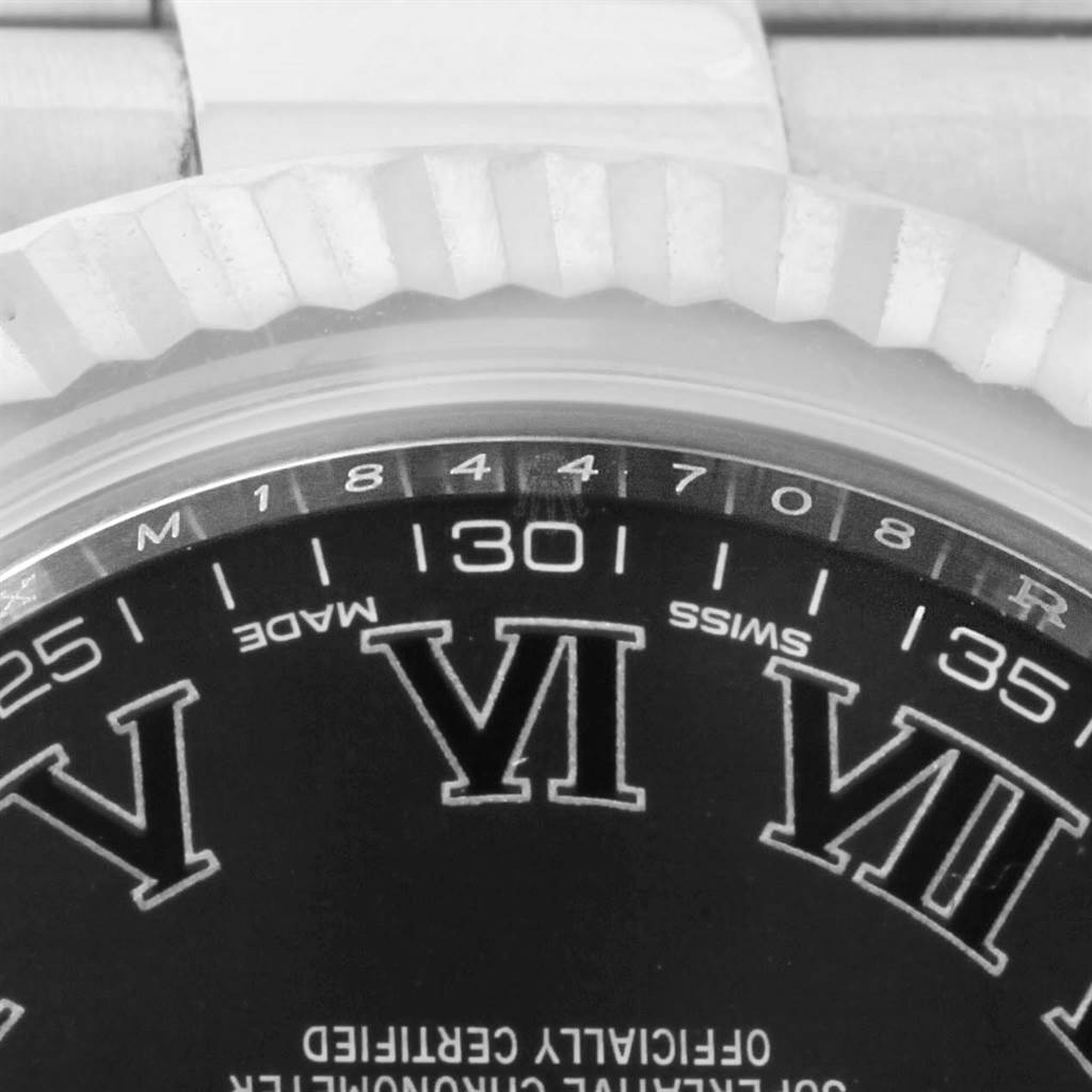 This close-up image shows the dial and bezel of the Rolex Datejust 41 116334 Men's Stainless Steel Grey Dial 116334 Men's Stainless Steel Grey Dial watch from an upward angle.