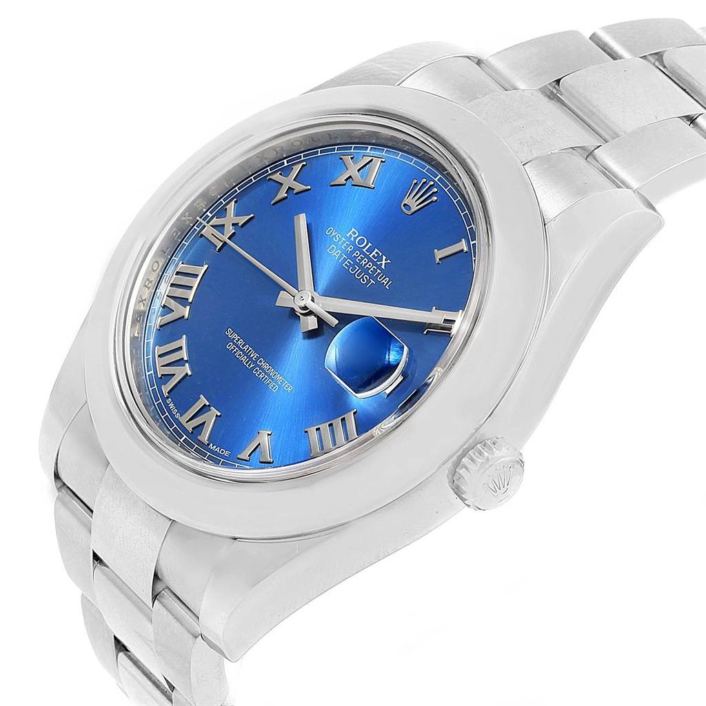 The image shows a Rolex Datejust 41 116300 Men
s Stainless Steel Blue Dial 116300 Men
s Stainless Steel Blue Dial watch from an angled top view, highlighting its blue dial, silver Roman numeral markers, and metal bracelet.