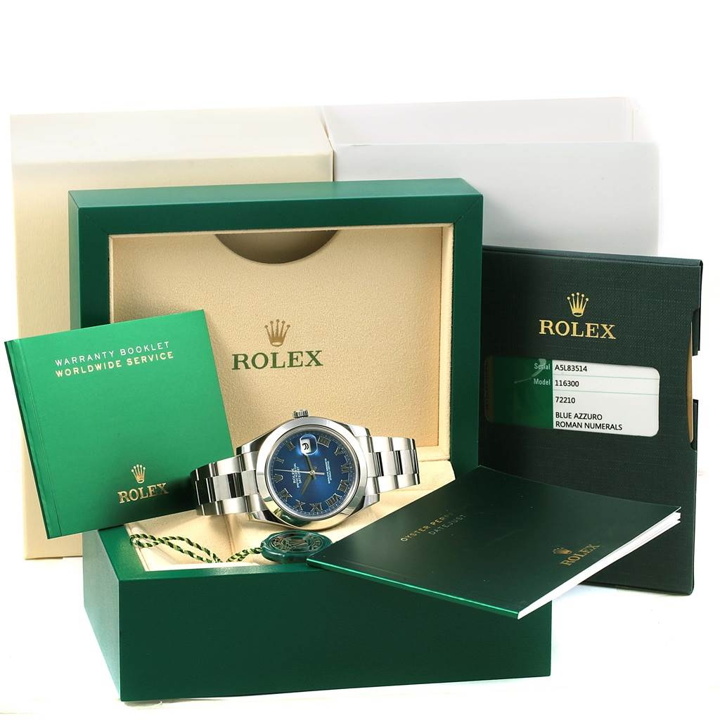 The image shows a Rolex Datejust 41 116300 Men
s Stainless Steel Blue Dial 116300 Men
s Stainless Steel Blue Dial watch in its box, along with warranty booklets and a tag, all viewed from the front.