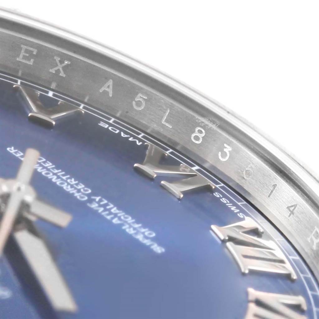 The image shows a close-up angle of the bezel and partial dial of a Rolex Datejust 41 116300 Men
s Stainless Steel Blue Dial 116300 Men
s Stainless Steel Blue Dial watch.