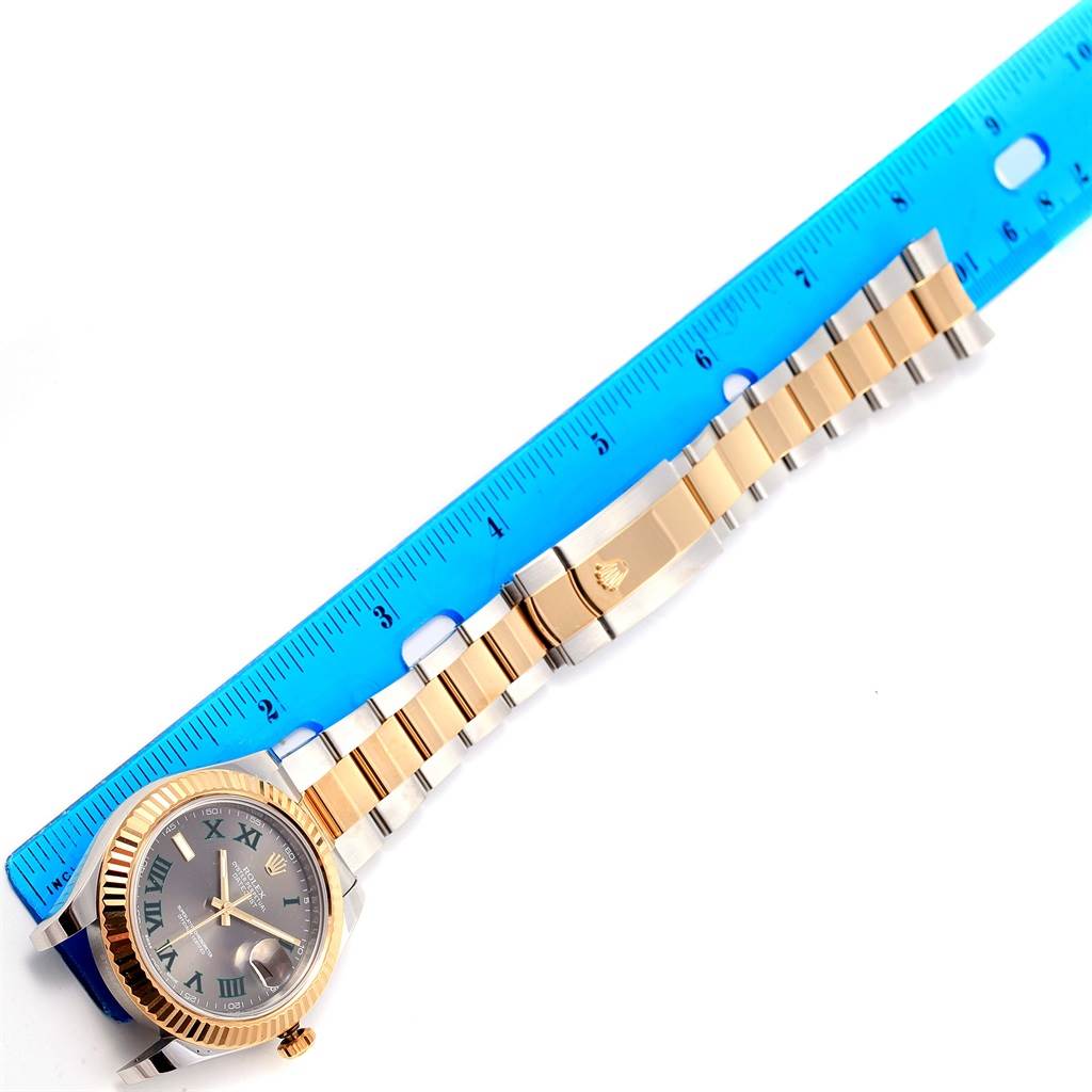 The image shows the Rolex Datejust 41 116333 Men's Steel and Gold (two tone) Grey Dial 116333 Men's Steel and Gold (two tone) Grey Dial watch from a top-down angle, including the watch face, the bracelet, and a blue ruler for scale.