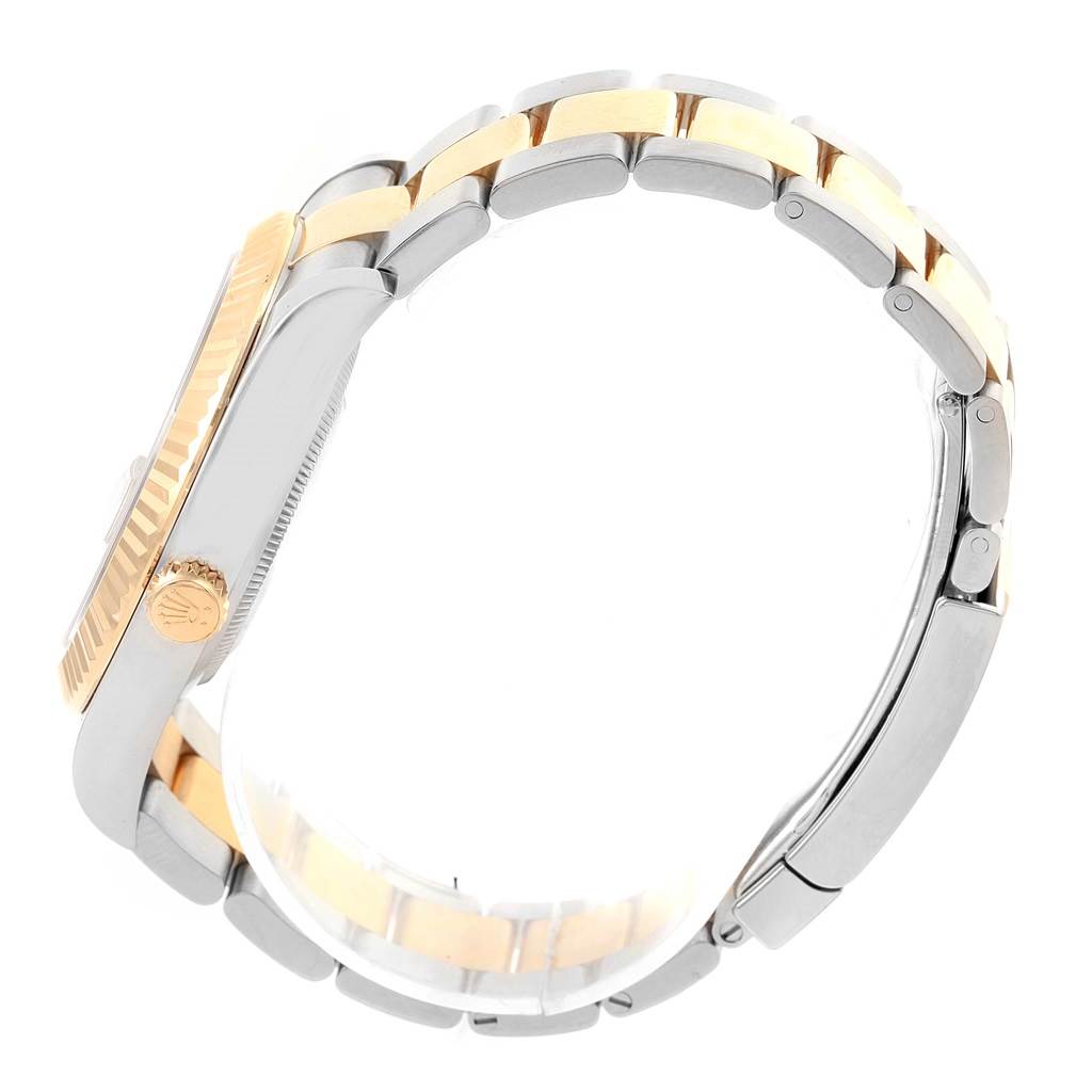 This image shows a side view of a Rolex Datejust 41 116333 Men's Steel and Gold (two tone) Grey Dial 116333 Men's Steel and Gold (two tone) Grey Dial watch, highlighting the case, fluted bezel, crown, and two-tone bracelet.