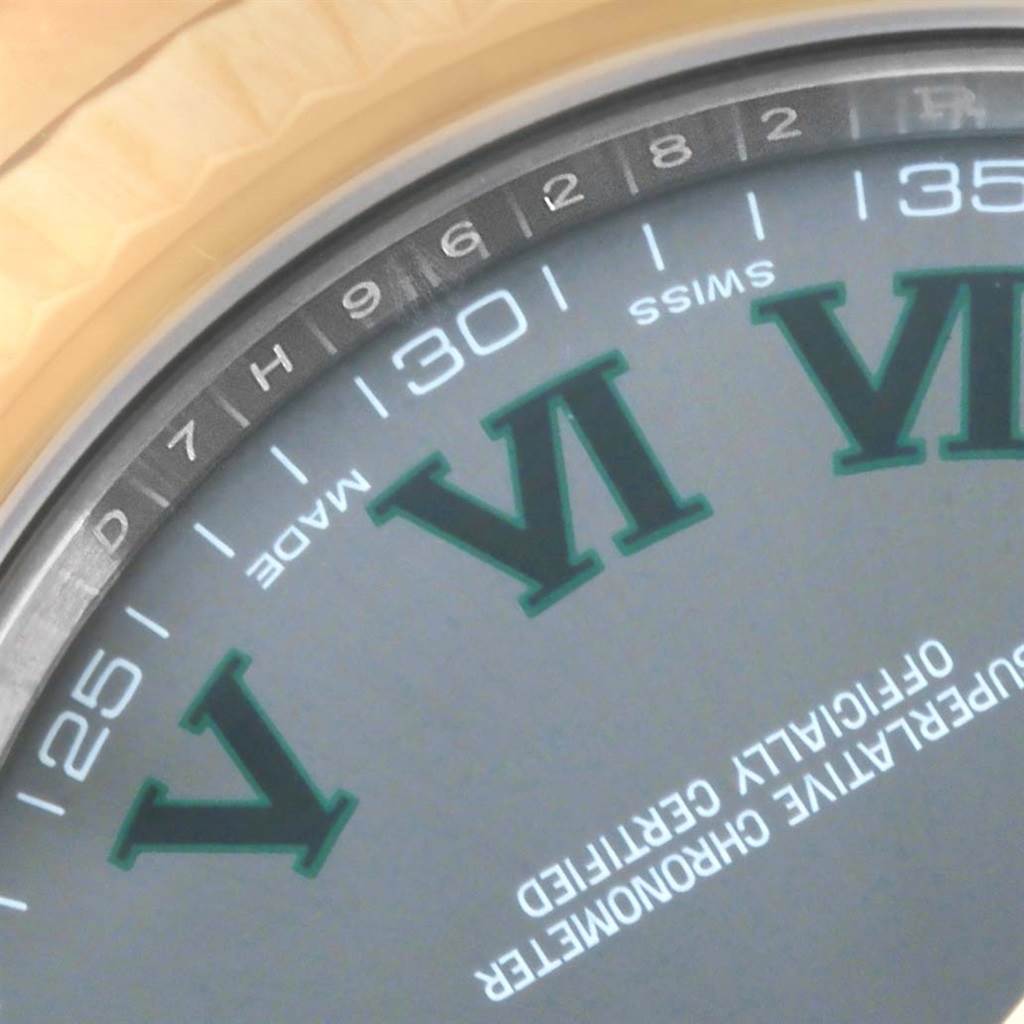 This image of the Rolex Datejust 41 116333 Men's Steel and Gold (two tone) Grey Dial 116333 Men's Steel and Gold (two tone) Grey Dial model shows a close-up of the watch face, highlighting the Roman numerals and surrounding numeric scale.