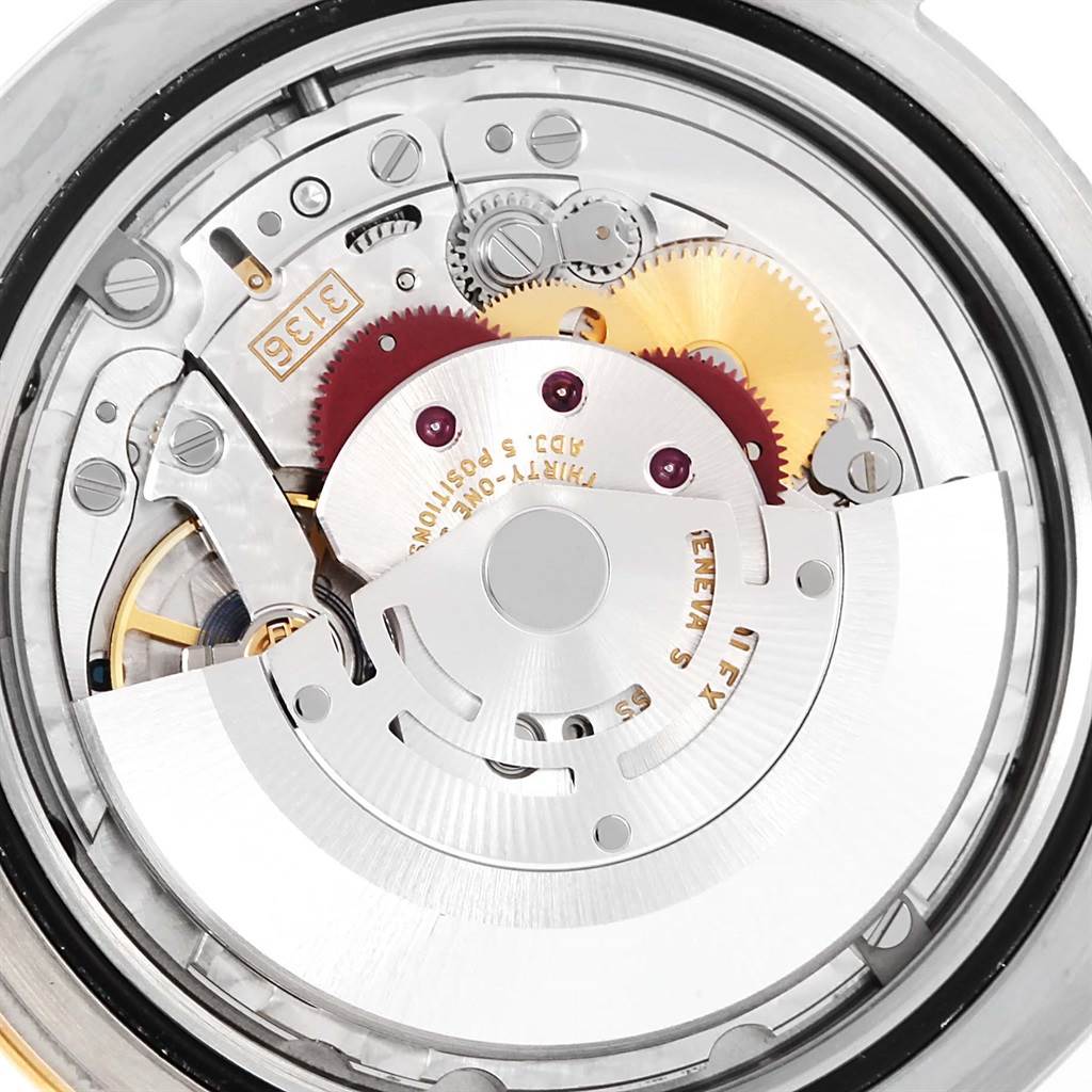 The image shows the internal movement mechanism of the Rolex Datejust 41 116333 Men's Steel and Gold (two tone) Grey Dial 116333 Men's Steel and Gold (two tone) Grey Dial watch from a close-up angle.