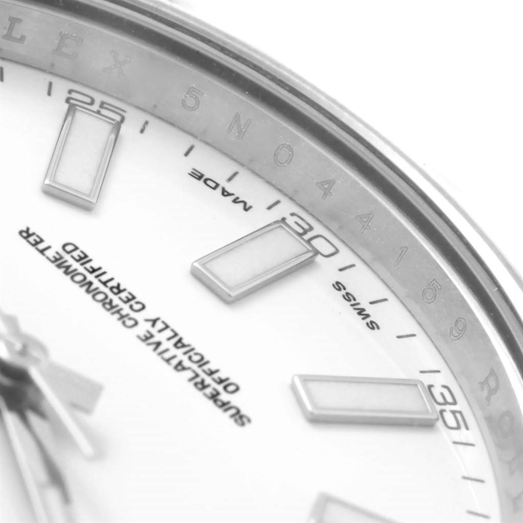 This close-up image focuses on the dial and minute markers of the Rolex Datejust 41 116300 Men
s Stainless Steel White Dial 116300 Men
s Stainless Steel White Dial watch, showcasing parts of its hour markers and text.