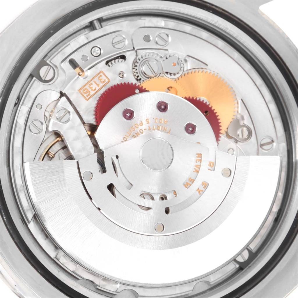 This is an up-close view of the internal mechanism of a Rolex Datejust 41 116300 Men
s Stainless Steel White Dial 116300 Men
s Stainless Steel White Dial watch, highlighting gears and parts.