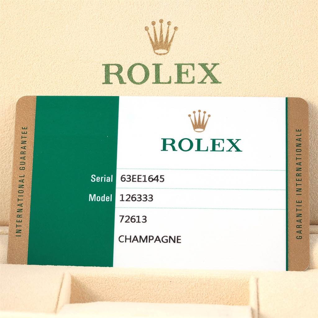This image shows an international guarantee card for a Rolex Datejust 41 126333 Men's Steel and Gold (two tone) Champagne Dial 126333 Men's Steel and Gold (two tone) Champagne Dial model 126333.