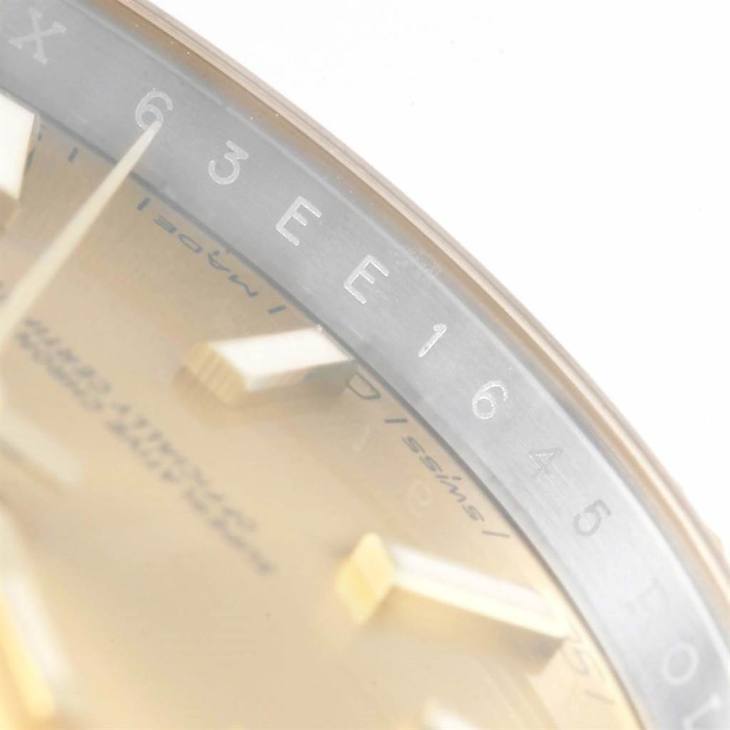 This image shows a close-up of the dial and rehaut of the Rolex Datejust 41 126333 Men's Steel and Gold (two tone) Champagne Dial 126333 Men's Steel and Gold (two tone) Champagne Dial, including markers and part of the engraved model details.