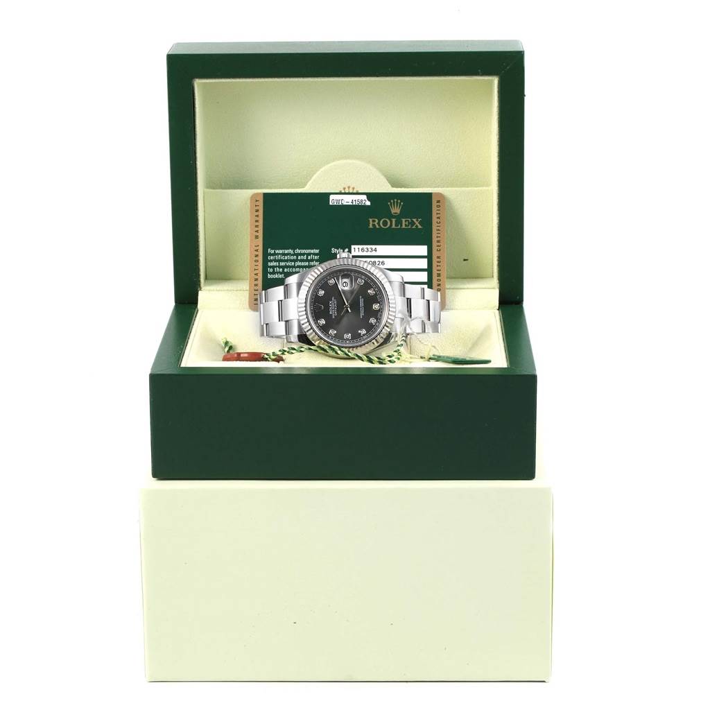 The Rolex Datejust 41 116334 Men's Stainless Steel Grey Dial 116334 Men's Stainless Steel Grey Dial is shown in its green presentation box, with the watch, warranty card, and tags visible.