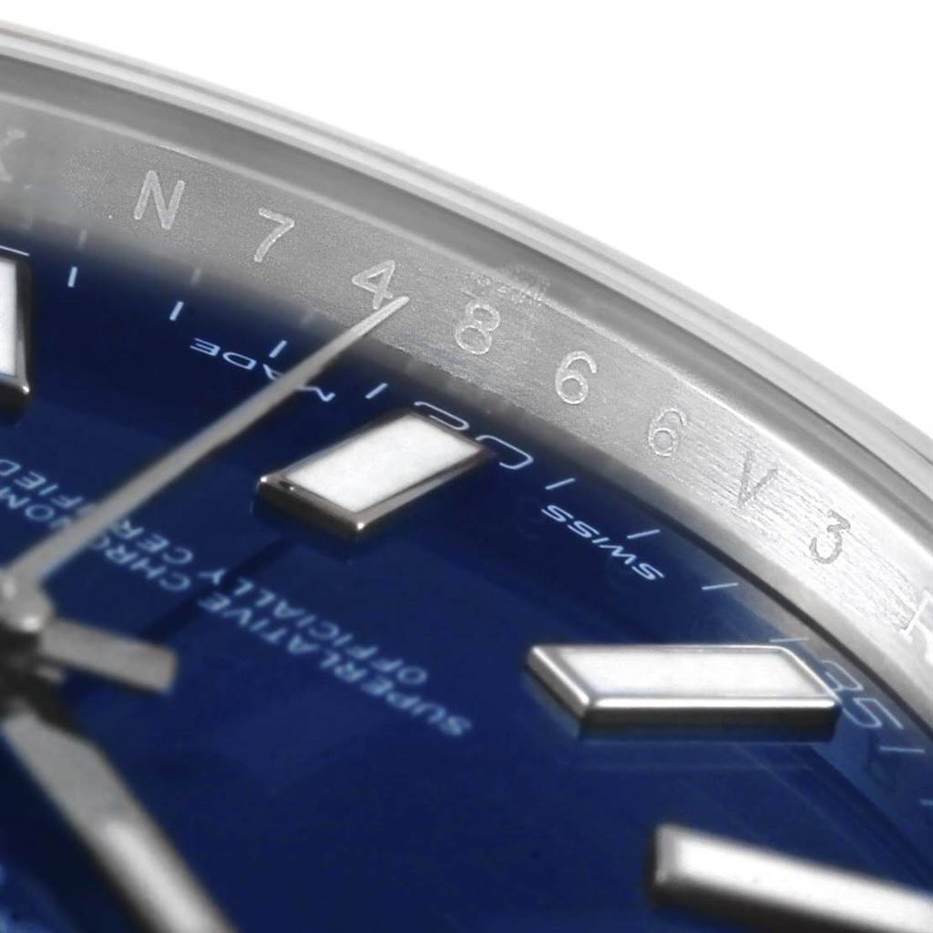 The image is a close-up of the Rolex Datejust 41 116300 Men's Stainless Steel Blue Dial 116300 Men's Stainless Steel Blue Dial watch, focusing on the dial, hour markers, and part of the bezel.