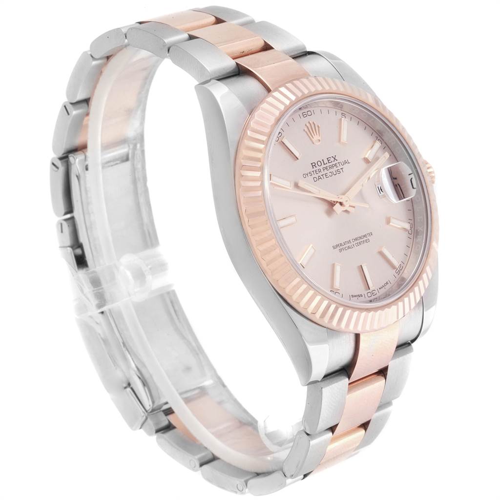The Rolex Datejust 41 126331 Men's Steel and Gold (two tone) Pink Dial 126331 Men's Steel and Gold (two tone) Pink Dial watch is shown at a side angle, displaying the face, fluted bezel, and two-tone bracelet.