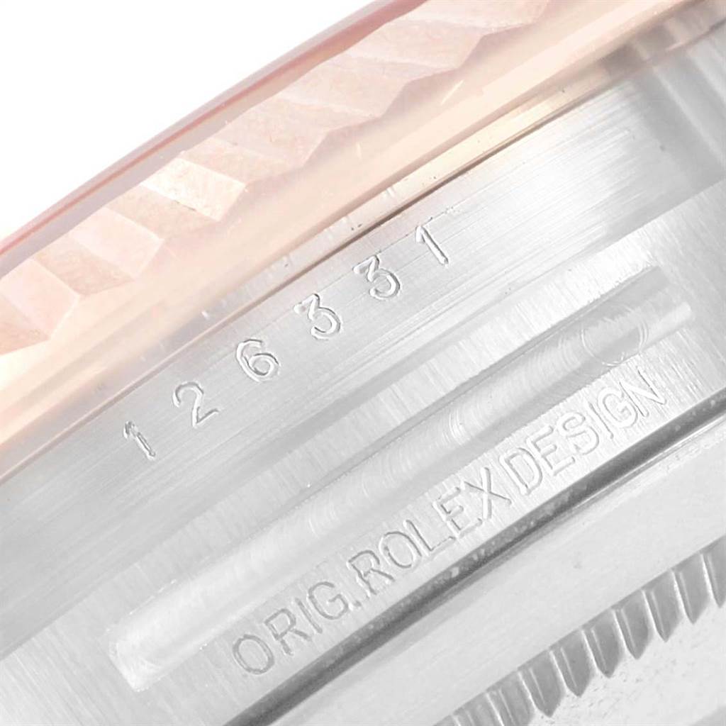 The image shows a close-up of the bezel and case side of a Rolex Datejust 41 126331 Men's Steel and Gold (two tone) Pink Dial 126331 Men's Steel and Gold (two tone) Pink Dial, displaying its model number and "ORIG. ROLEX DESIGN" engraving.