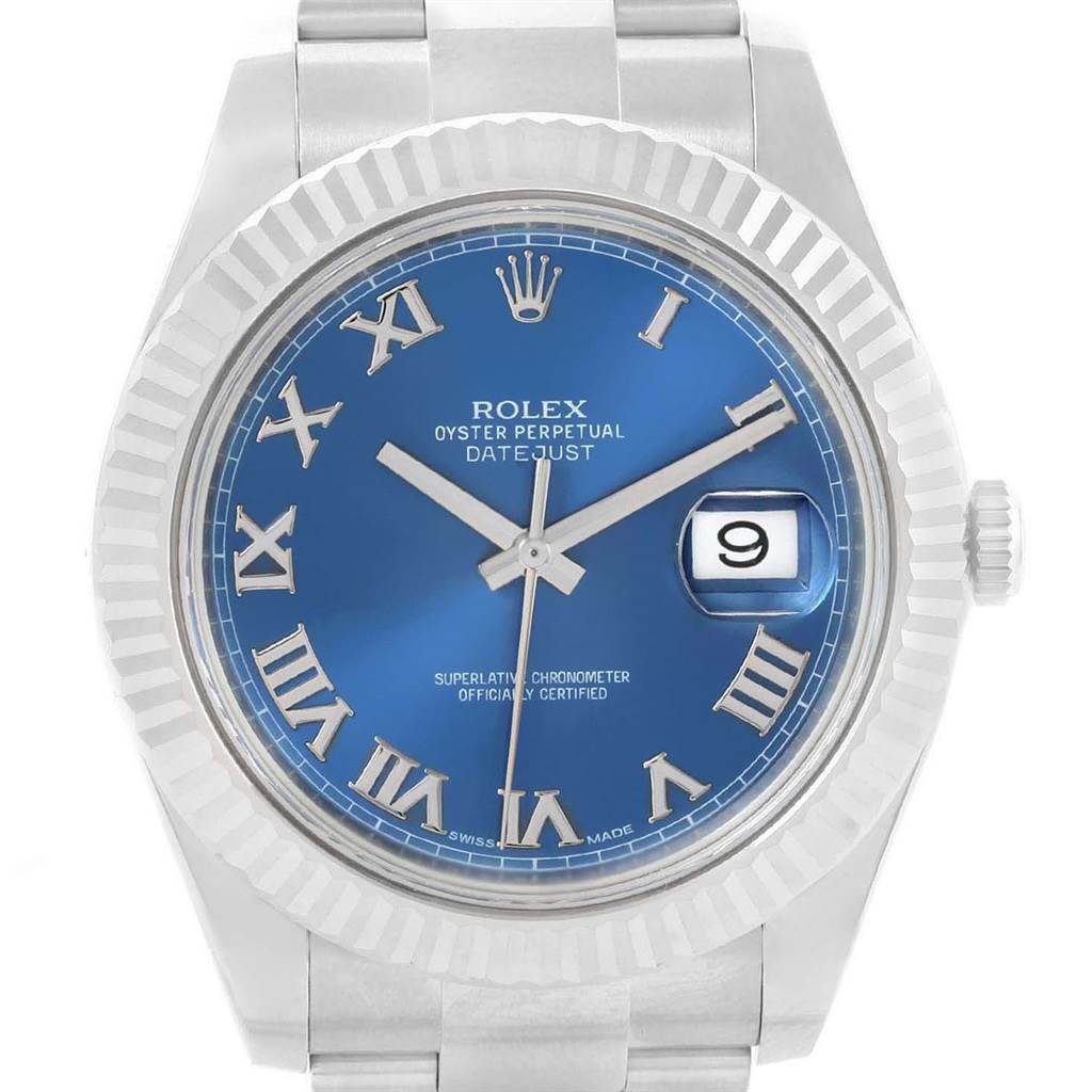 The Rolex Datejust 41 116334 Men's Stainless Steel Blue Dial 116334 Men's Stainless Steel Blue Dial watch is shown from a front angle, displaying its blue dial, roman numerals, and date window at 3 o'clock.