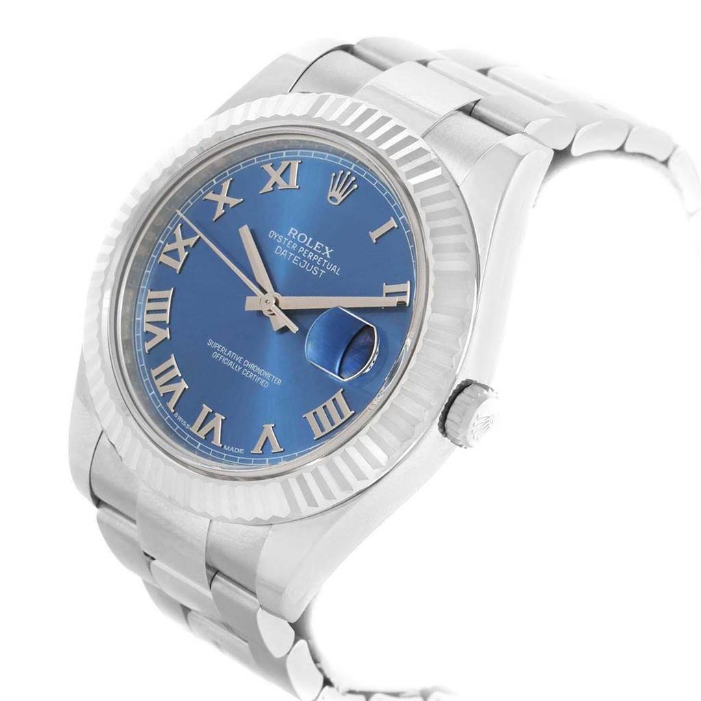 The image shows a close-up, angled view of a Rolex Datejust 41 116334 Men's Stainless Steel Blue Dial 116334 Men's Stainless Steel Blue Dial with a blue dial, Roman numerals, and a stainless steel bracelet.