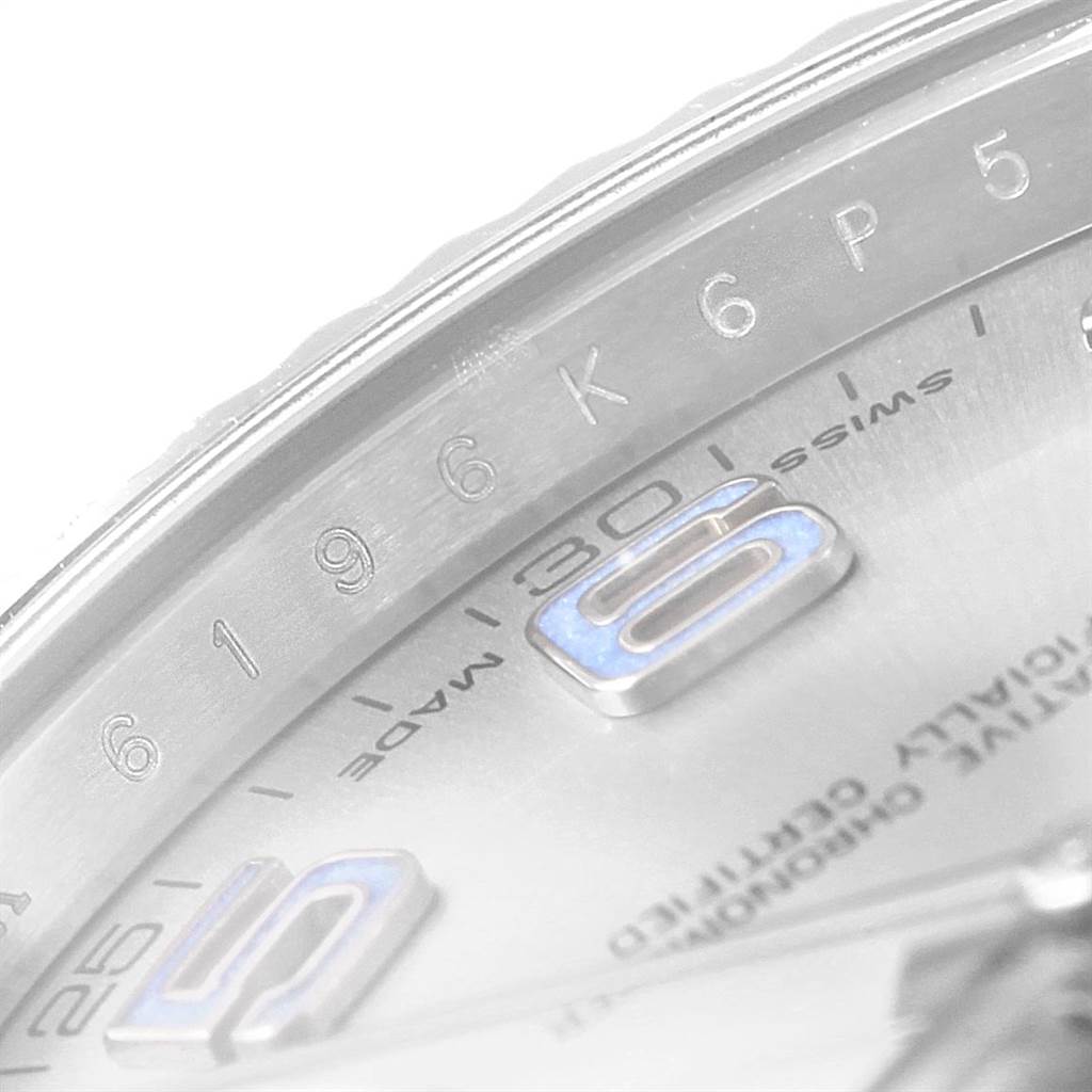 This is a close-up of the dial on a Rolex Datejust 41 116334 Men's Stainless Steel Grey Dial 116334 Men's Stainless Steel Grey Dial, showing the numbers and part of the bezel.