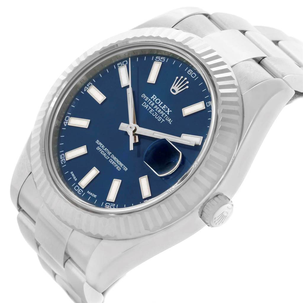 This image shows a close-up view of the Rolex Datejust 41 116334 Men's Stainless Steel Blue Dial 116334 Men's Stainless Steel Blue Dial watch, highlighting its blue dial, hour markers, and fluted bezel.
