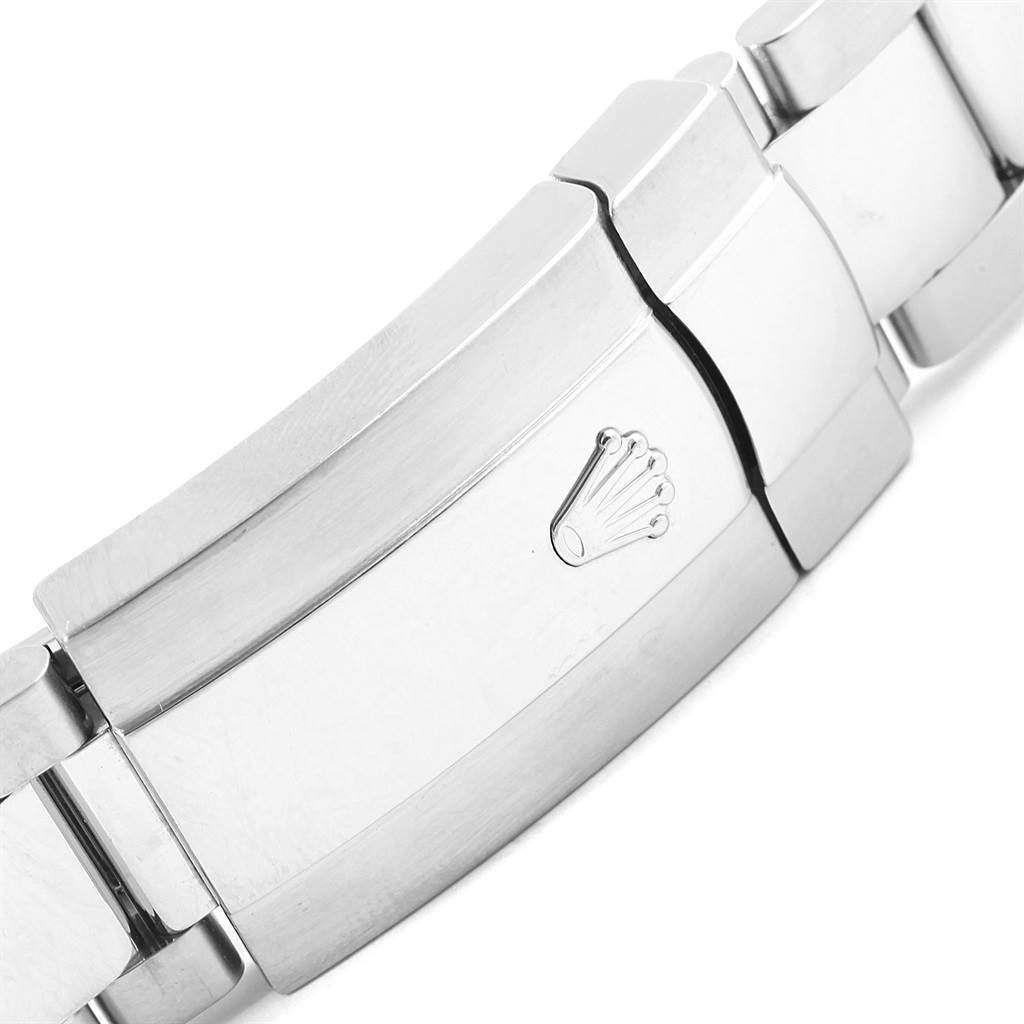 This image shows a close-up of the clasp from a Rolex Datejust 41 116334 Men's Stainless Steel Blue Dial 116334 Men's Stainless Steel Blue Dial watch.