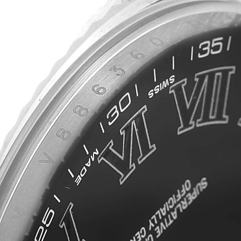 This image shows a close-up of the Rolex Datejust 41 116334 Men's Stainless Steel Grey Dial 116334 Men's Stainless Steel Grey Dial watch dial, focusing on the Roman numerals and minute indicators.