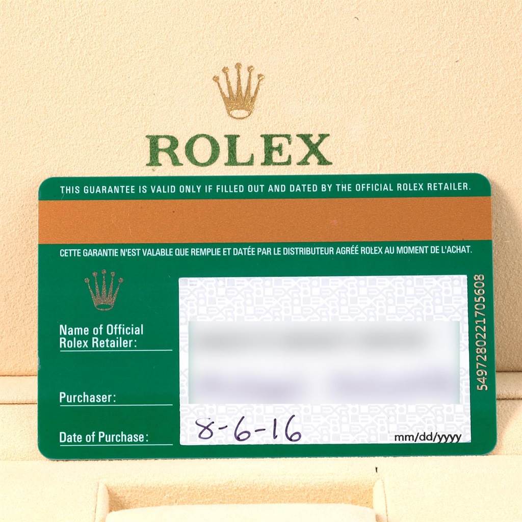 The image shows a Rolex guarantee card for the Datejust 41 model, photographed from a top-down angle.