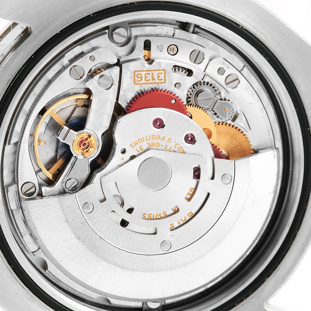 This image shows the internal mechanism of a Rolex Datejust 41 116334 Men's Stainless Steel Blue Dial 116334 Men's Stainless Steel Blue Dial watch from a close-up rear angle, highlighting the movement components.
