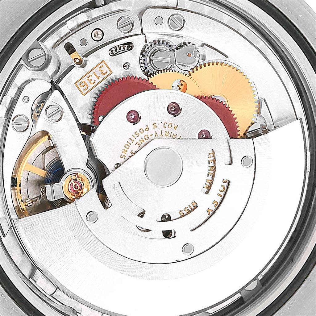 This is a close-up view of the movement inside the Rolex Datejust 41 116334 Men's Stainless Steel Grey Dial 116334 Men's Stainless Steel Grey Dial watch, showing gears and mechanical components.