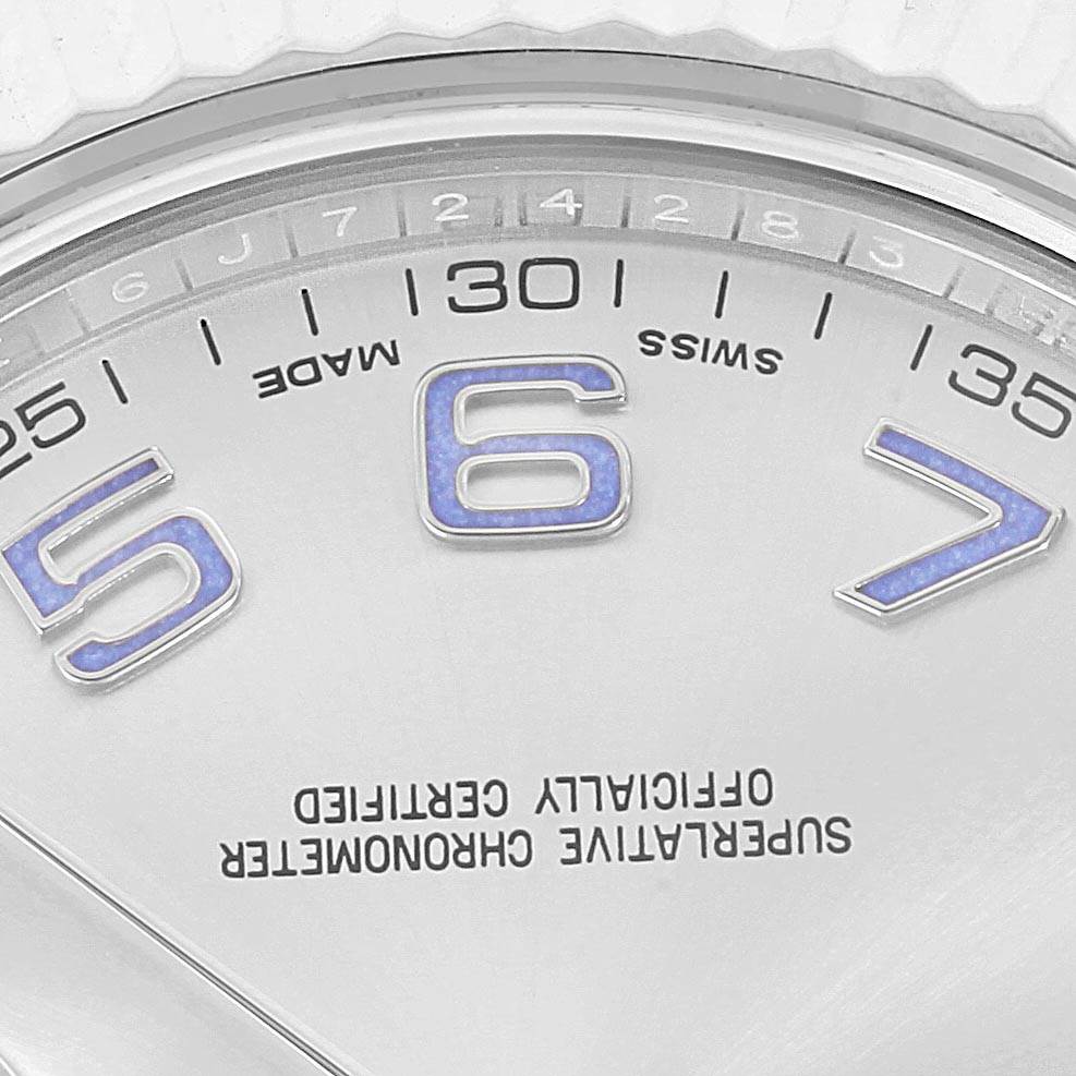 The image shows a close-up of the dial, hands, and numerals 5-7 on the Rolex Datejust 41 116334 Men's Stainless Steel Grey Dial 116334 Men's Stainless Steel Grey Dial model.