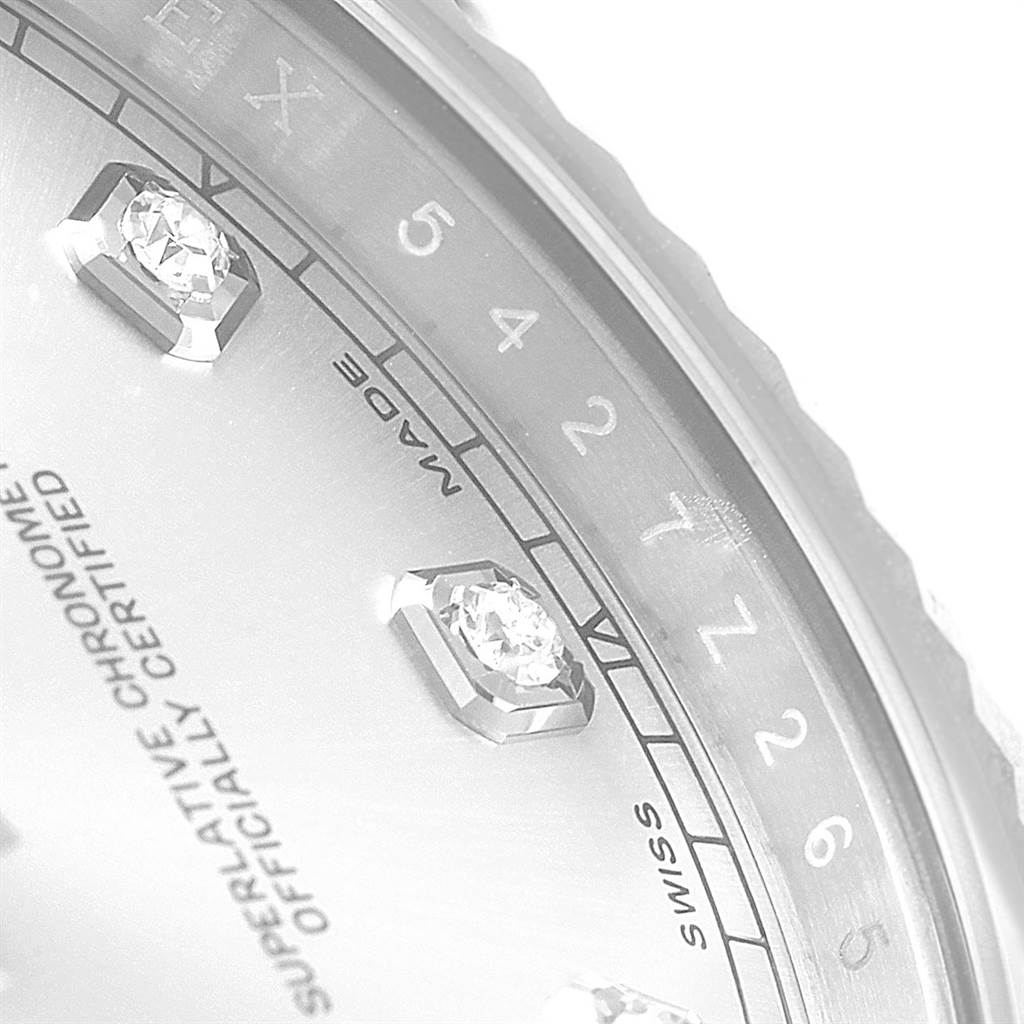 This is a close-up angle of the Rolex Datejust 41 116334 Men's Stainless Steel Silver Dial 116334 Men's Stainless Steel Silver Dial watch, showing part of the dial with diamond hour markers and the inner bezel.