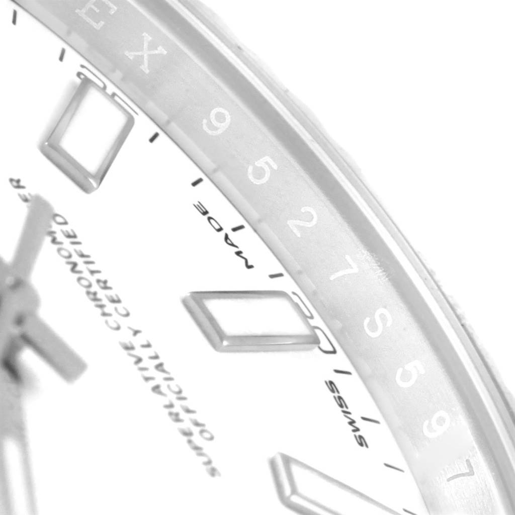 The image shows a close-up of the dial and bezel with engraved numerals of a Rolex Datejust 41 116334 Men's Stainless Steel White Dial 116334 Men's Stainless Steel White Dial watch.