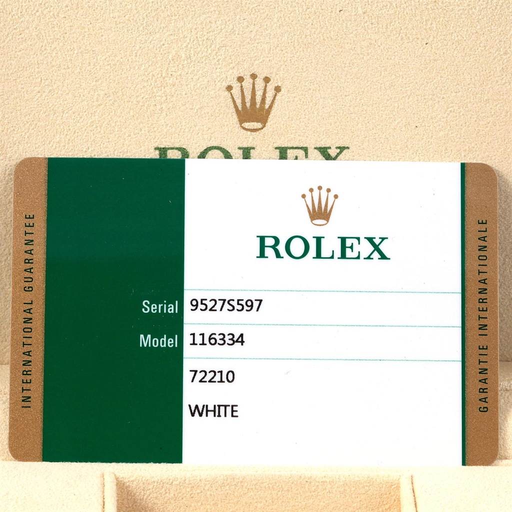 The image shows a Rolex international guarantee card for the Datejust 41 model, displaying serial number, model number, and other details.