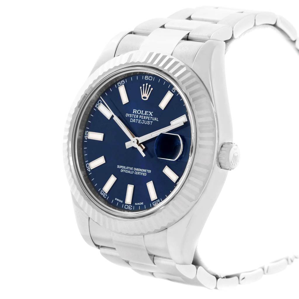 The Rolex Datejust 41 116334 Men's Stainless Steel Blue Dial 116334 Men's Stainless Steel Blue Dial watch is shown from a slight side angle, highlighting its blue dial, fluted bezel, and stainless steel bracelet.